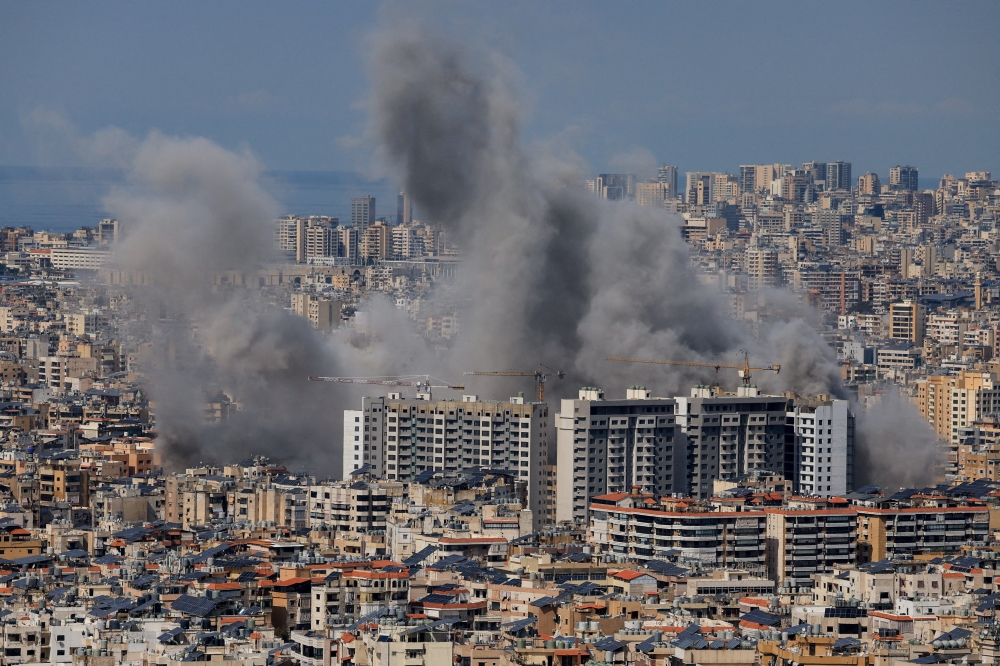 Smoke billows after reported strikes on Beirut’s southern suburbs, following an escalation between Hezbollah and Israel amid the US-Israeli conflict with Iran, as seen from Baabda, Lebanon, March 6, 2026. — Reuters pic 