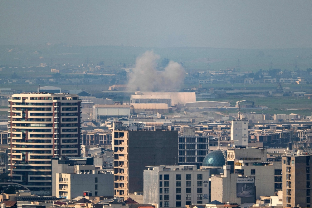 Smoke rises after an explosion near Erbil International Airport in Erbil on March 6, 2026. — AFP pic 