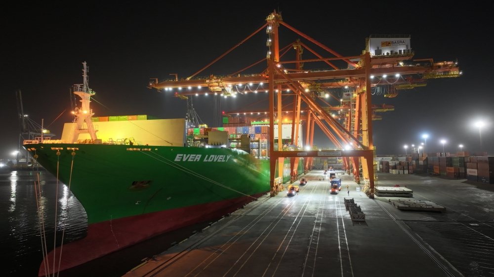A drone view of an Evergreen container ship docked at the port of Umm Qasr during nighttime operations in Basra. The author argues that rising Middle East tensions could reshape global trade and energy flows — and Malaysia should seize the moment by strengthening its maritime infrastructure and investment ecosystem to emerge as a strategic regional hub. — Reuters pic