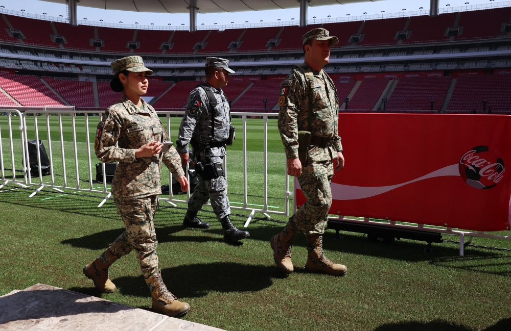 A member of the National Guard and members of the armed forces patrol inside the Akron Stadium in Guadalajara February 28, 2026. — Reuters pic