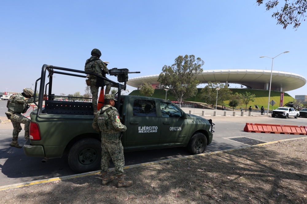 Members of the armed forces are seen outside the Akron Stadium in Guadalajara February 28, 2026. — Reuters pic