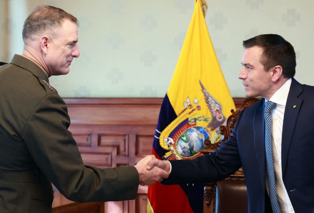 This handout picture released by the Ecuadorian Presidency shows Ecuador's President Daniel Noboa (right) shaking hands with US Southern Command chief Gen. Francis Donovan during a meeting in the Cabinet Room of the Carondelet Palace in Quito on March 2, 2026. — Ecuadorian Presidency handout pic via Reuters 