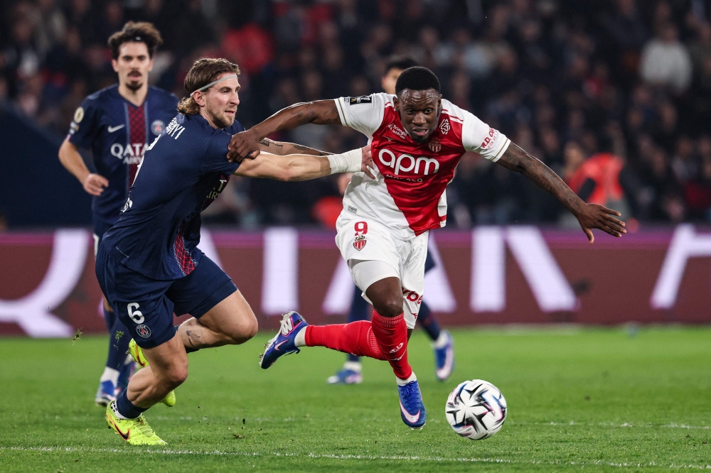 Monaco's US forward #09 Folarin Balogun (right) fights for the ball with Paris Saint-Germain's Ukrainian defender #06 Illia Zabarnyi  during the French L1 football match between Paris Saint-Germain (PSG) and AS Monaco at the Parc des Princes stadium in Paris on March 6, 2026. — AFP pic 