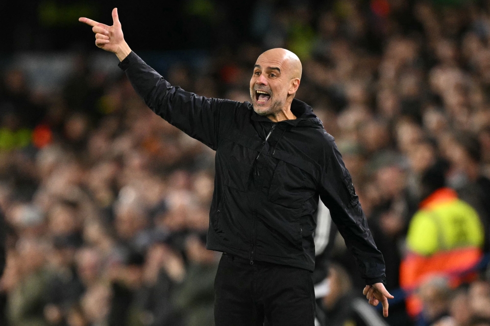Pep Guardiola knows Manchester City are not a ‘complete team’ but he is convinced they can still overhaul Arsenal in the Premier League title race. — AFP pic 