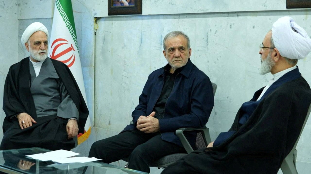 Iranian President Masoud Pezeshkian, Gholam-Hossein Mohseni-Eje'i, the head of the judiciary and Alireza Arafi, deputy chairman of the Assembly of Experts, attend the meeting of the interim leadership council of Iran in an unknown location, amid the US-Israel conflict with Iran, in Iran, March 1, 2026. — IRIB/WANA (West Asia News Agency) handout pic via Reuters 