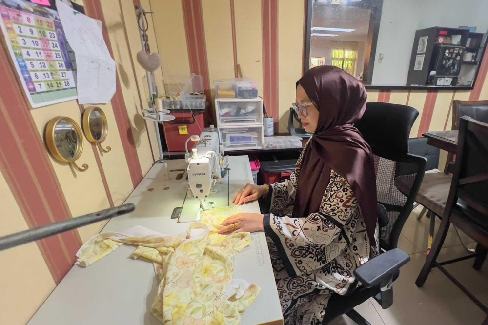 From choosing the fabric and cut to adding personalised details, tailoring allows Malaysians to have ‘baju raya’ that perfectly matches their taste and body type, something ready-made options rarely offer. — Picture by Raymond Manuel 