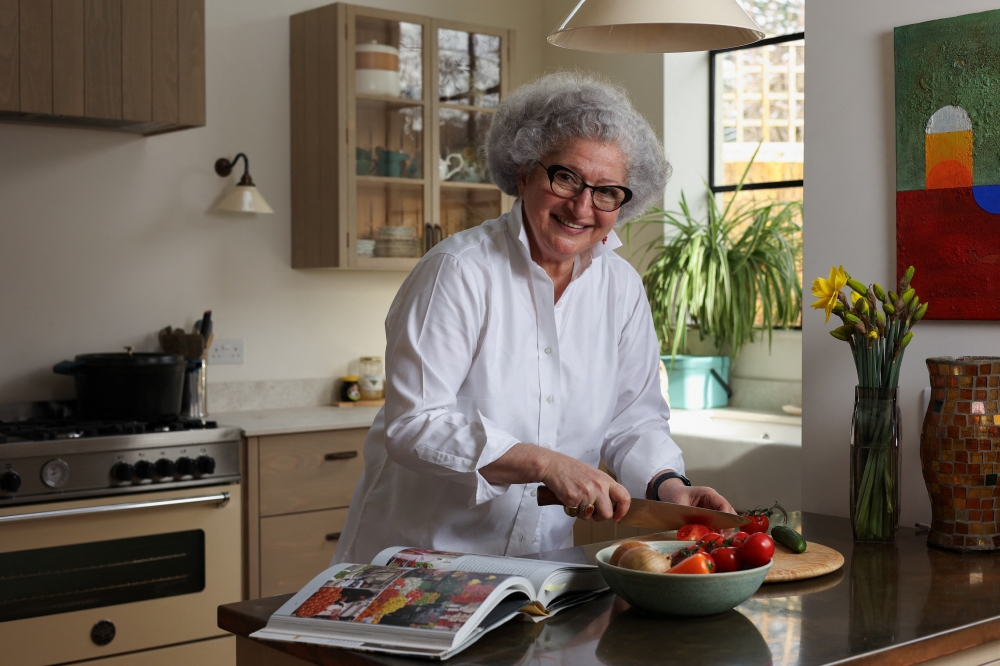 Chef and James Beard Award-winning food writer Anissa Helou speaks with Reuters while chopping vegetables ahead of the March 10, 2026 launch of her new cookbook ‘Lebanon: Cooking the Foods of My Homeland’, in London, Britain on February 23, 2026. — Reuters pic