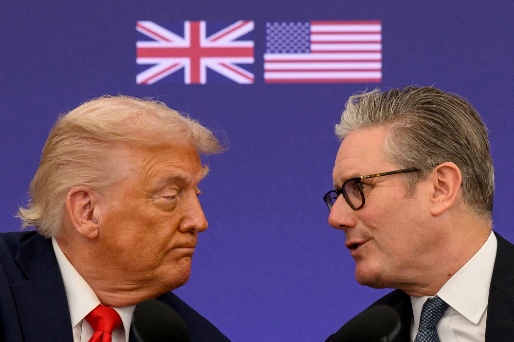 US President Donald Trump and British Prime Minister Keir Starmer attend a press conference at Chequers in Aylesbury, Britain on September 18, 2025. — Reuters pic