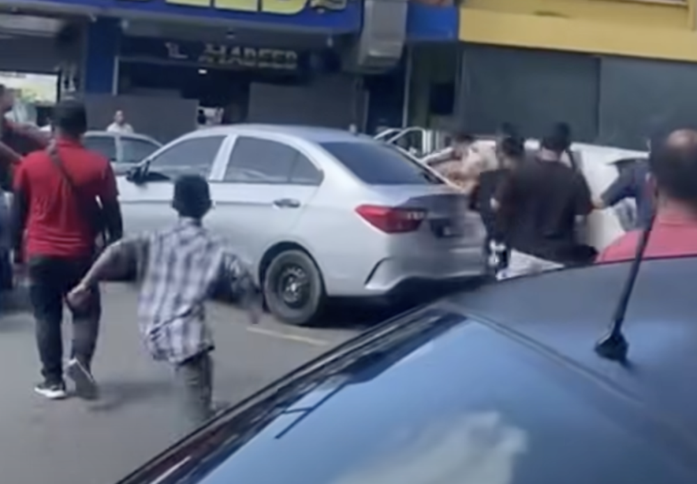 A video of the incident at Batu 8 market in Sandakan later circulated widely on social media. — Screengrab from Facebook video