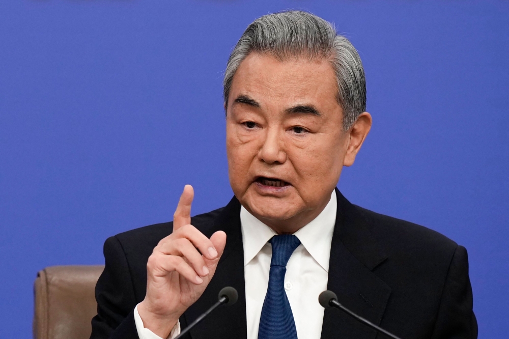 Chinese Foreign Minister Wang Yi attends a press conference on the country’s foreign policy and external relations for the fourth session of the 14th National People’s Congress (NPC) in Beijing on March 8, 2026. — AFP pic
