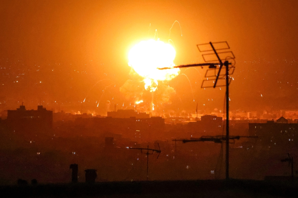 Explosions erupt following strikes in Tehran on March 7, 2026. — AFP pic