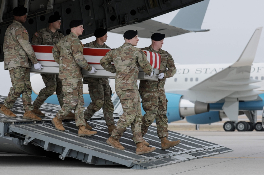 A US Army carry team moves a flag-draped transfer case containing the remains of Chief Warrant Officer 3 Robert M. Marzan at Dover Air Force Base in Dover, Delaware on March 7, 2026. — Getty Images/AFP pic
