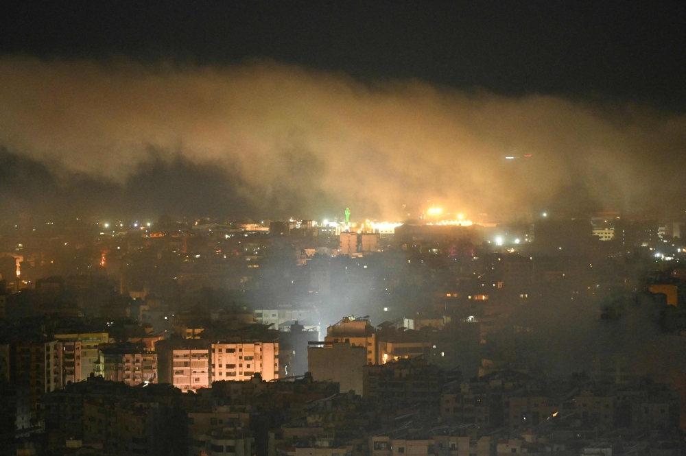 Smoke rises after an Israeli airstrike targeted an area in Beirut’s southern suburbs on March 7, 2026. — AFP pic