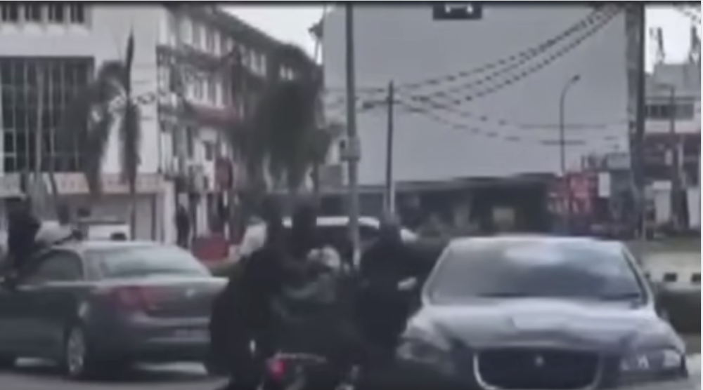 Muslim preacher Zamri Vinoth posted a video clip that he claims shows a group of men and a motorcycle following him to his car and the collision after, on March 7, 2026. — Screenshot from Facebook/Zamri Vinoth