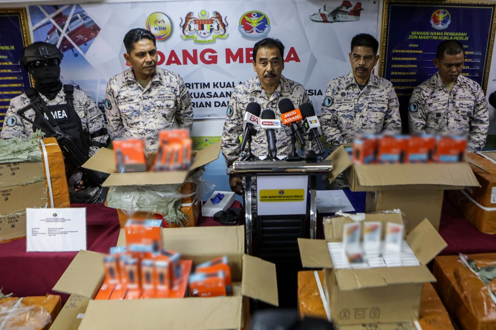 Kedah and Perlis Maritime director First Admiral Romli Mustafa (centre) during a press conference at the Kuala Perlis Maritime Zone Office in Kangar March 8, 2026. — Bernama pic