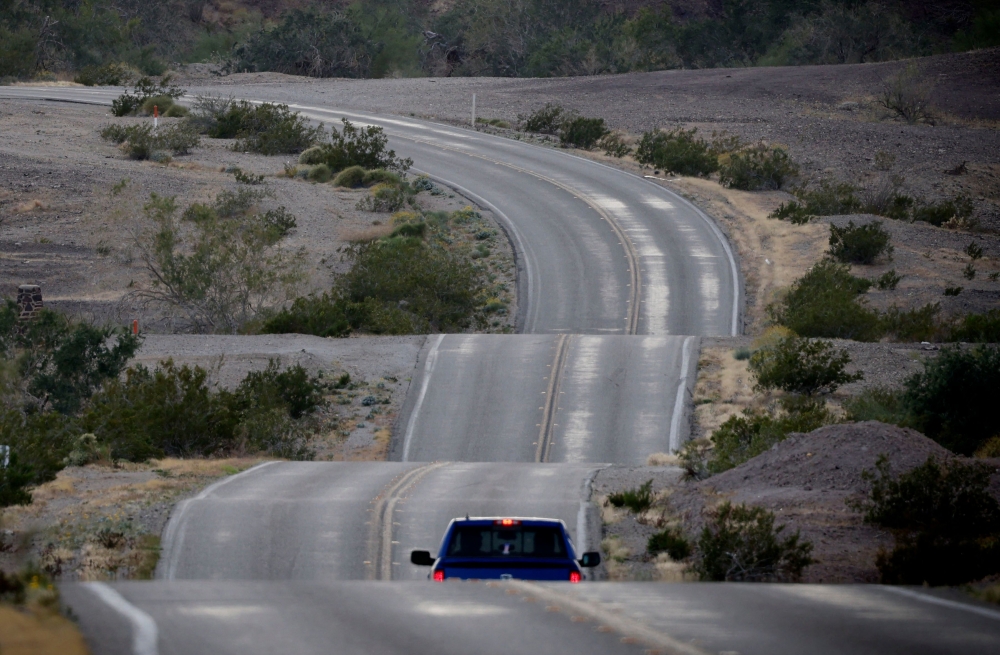 A car drives down the car chase road where the film 