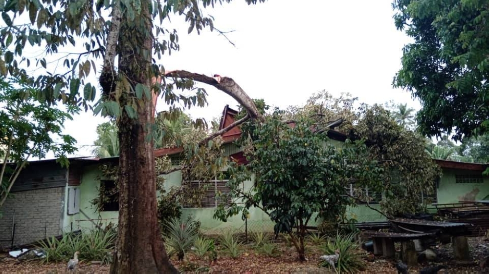 Dozens of homes were damaged after a storm hit several areas in northern Seberang Perai. — Picture via Facebook