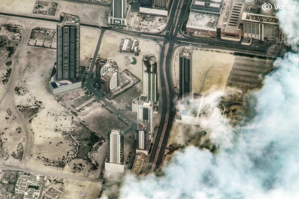This handout satellite image shows damage following a drone attack on a high-rise apartment building in Manama, Bahrain on March 2, 2026. — Vantor/AFP pic