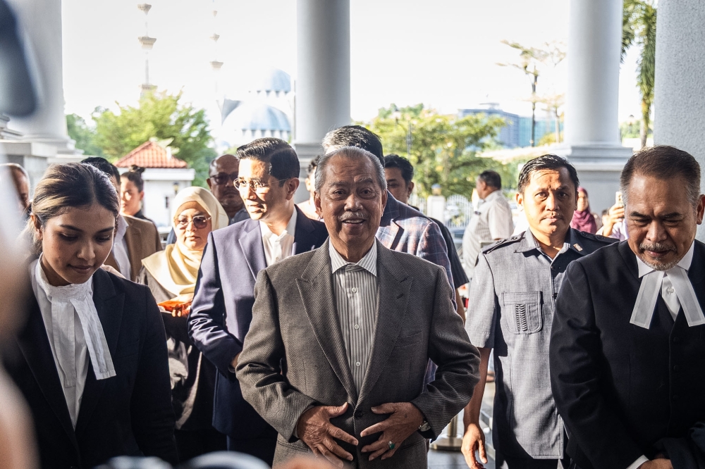 Former prime minister Tan Sri Muhyiddin Yassin is pictured at the Kuala Lumpur Court Complex, in Kuala Lumpur, March 9, 2026. — Picture by Firdaus Latif