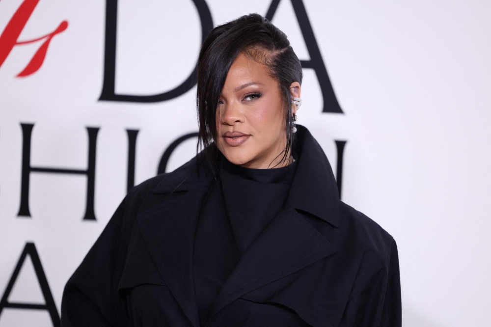 Barbadian pop singer Rihanna was inside the Los Angeles house that she shares with partner A$AP Rocky and their children, but unharmed when a woman  in her 30s allegedly fired 10 rounds at it from a vehicle across the road on March 8, 2026. — AFP pic