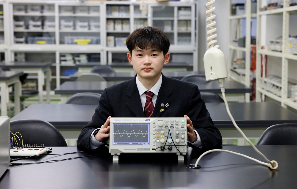 Takuma Hashimoto is studying engineering at a technical college in Iwaki, Fukushima prefecture. — Reuters pic