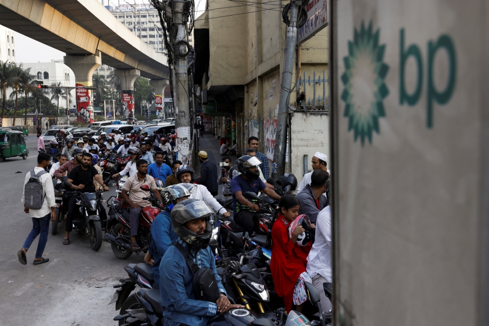 Vehicles queue at a fuel station in Dhaka as concerns mount over supplies following the US–Israel conflict with Iran, March 6, 2026. — Reuters pic