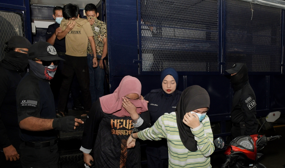 The eight individuals at the Sessions Court in Butterworth, March 10, 2026. — Bernama pic 