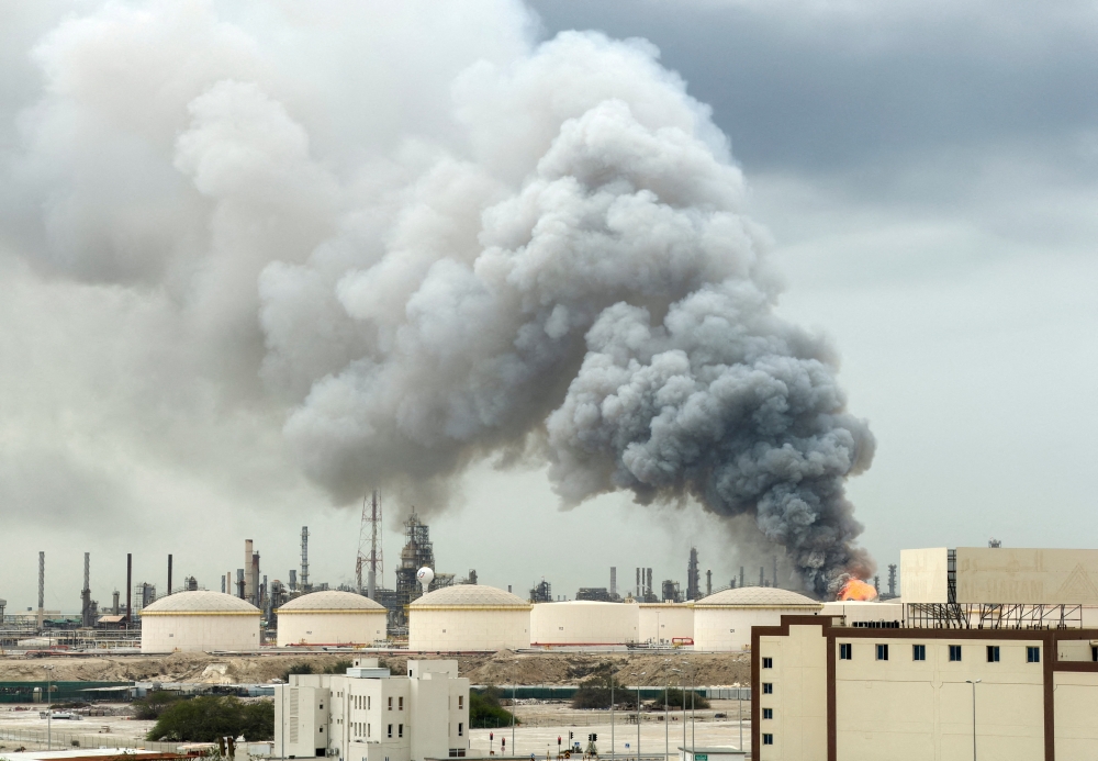 Smoke rises following a strike on the Bapco Oil Refinery on Sitra Island, Bahrain on March 9, 2026. — Reuters pic