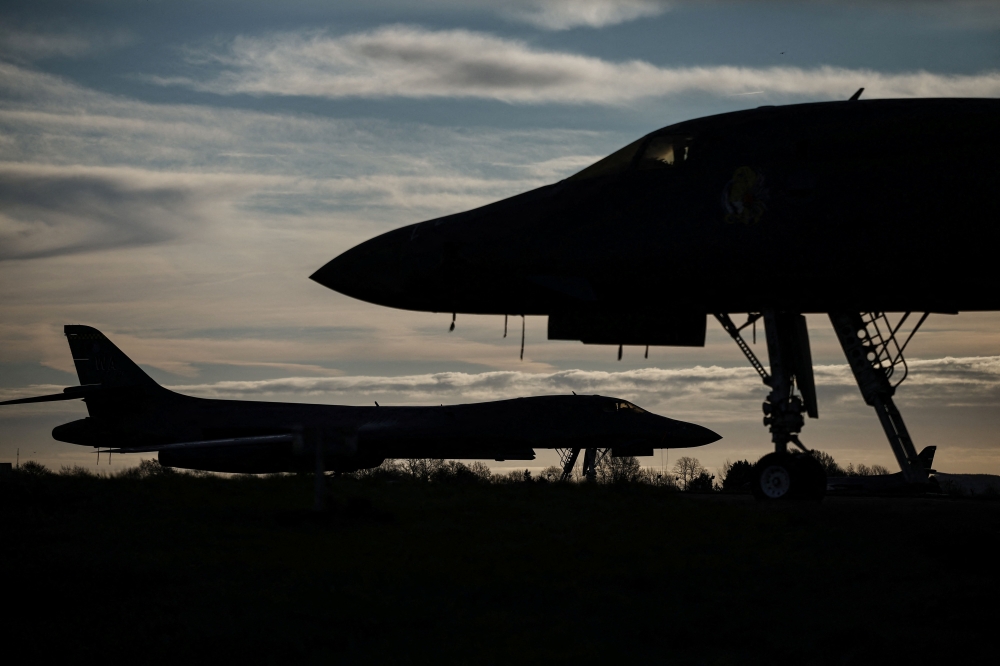 US Air Force B-1 Lancer bombers are pictured on the tarmac after arriving overnight at RAF Fairford in south-west England yesterday. — AFP pic