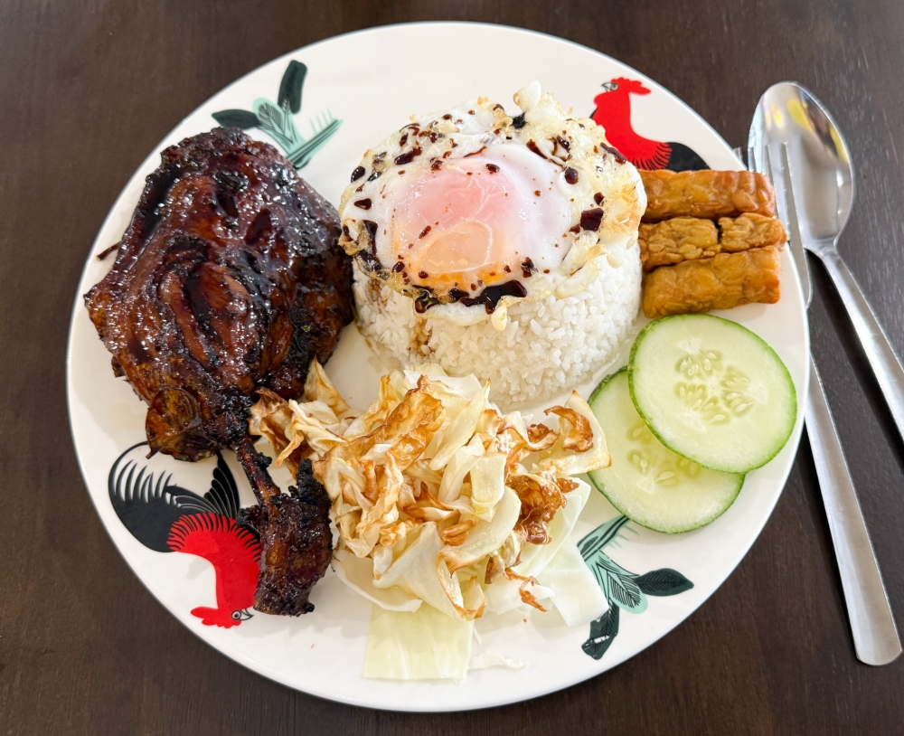 A new addition to the menu is the grilled duck served in the Mad Grilled Bebek Signature. — Picture by Lee Khang Yi