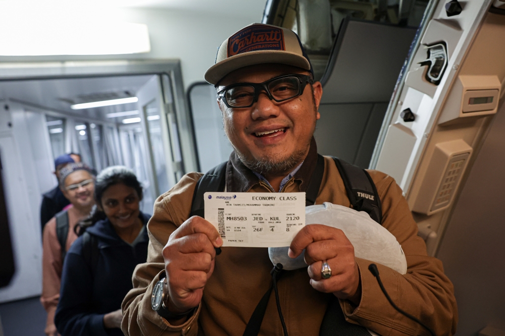 Malaysians stranded in Saudi Arabia, Syria, Jordan and Qatar prepare to board a specially chartered Malaysia Airlines flight home under an evacuation operation at King Abdulaziz International Airport on March 20, 2026. — Bernama pic