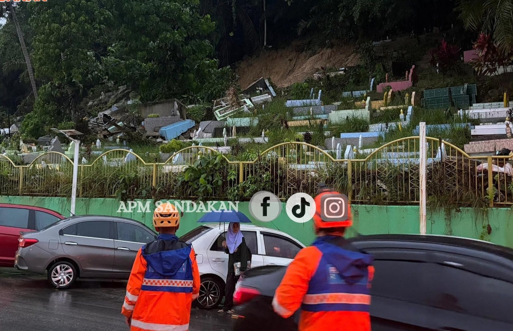Sandakan Civil Defence district officer Sulaiman Salama said authorities received a report on the incident at about 6am, with the collapse believed to have been triggered by heavy rain since yesterday. — Picture from Facebook/APM Sandakan