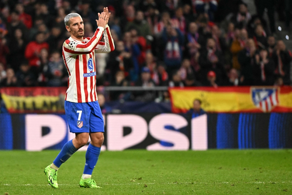 Atletico Madrid's French forward Antoine Griezmann claps after being substituted during the Uefa Champions League last 16 first leg football match against Tottenham Hotspur. — AFP pic