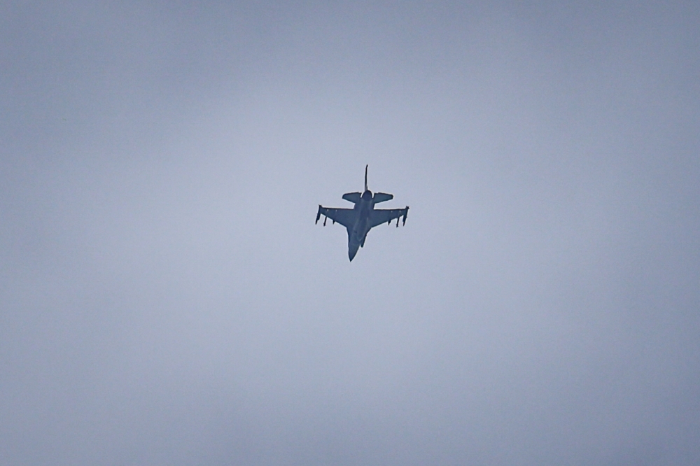 A United Arab Emirates Air Force F-16 fighter jet flies over Dubai on March 11, 2026. The Gulf countries have long been seen as islands of stability in the Middle East, but the war in the region could threaten their prosperity, analysts said, pointing to risks to their revenues and reputations as business havens. — AFP pic 