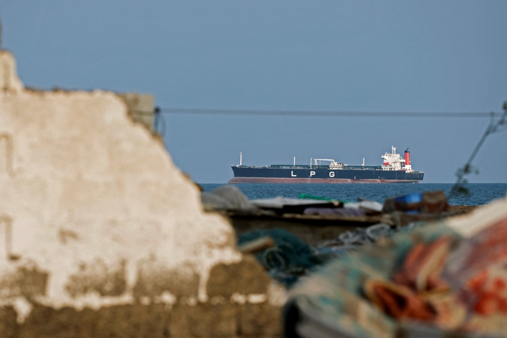 A LPG gas tanker sits anchored as the traffic is down in the Strait of Hormuz, amid the US-Israeli conflict with Iran, in Shinas, Oman, March 11, 2026. — Reuters pic