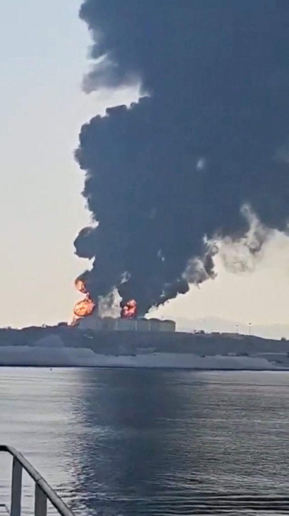 A plume of smoke raises from oil storage facilities at the Port of Salalah in Raysut, Oman in this screen capture from video obtained from social media and released March 11, 2026. — Social media pic via Reuters