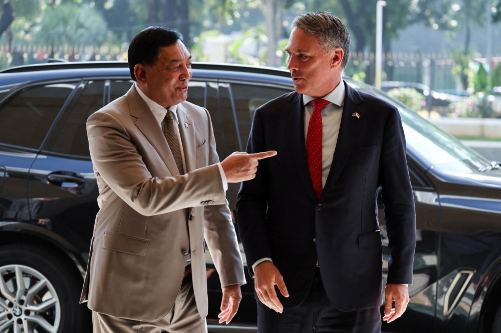 Australian Deputy Prime Minister and Minister for Defence Richard Marles interacts with Indonesia's Defense Minister Sjafrie Sjamsoeddin upon their meeting in Jakarta, Indonesia, March 12, 2026. — Reuters pic