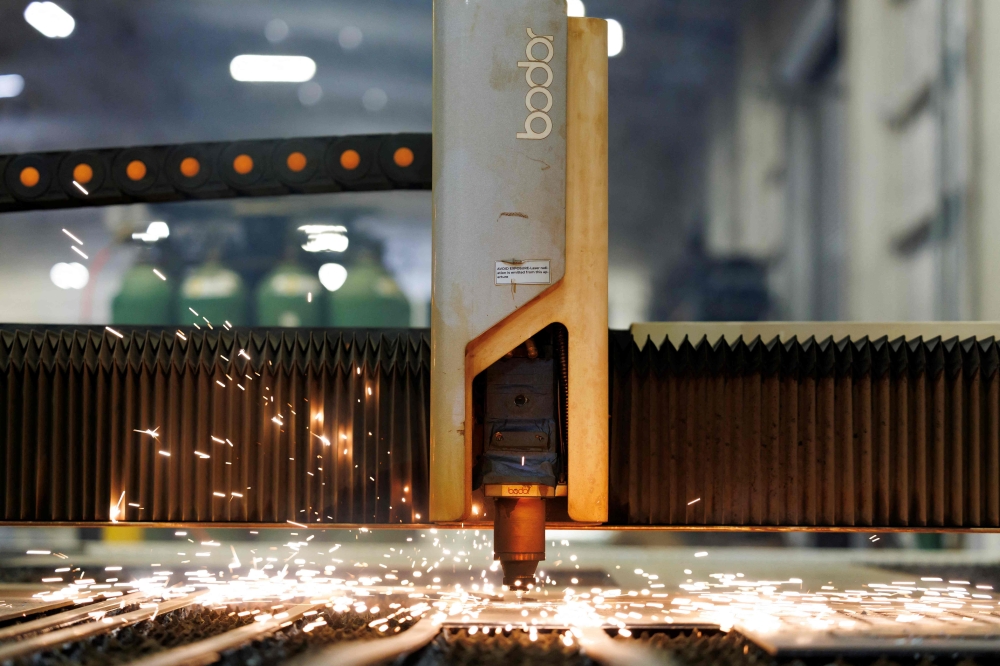 A laser cutter operates at the Atlas Survival Shelters factory in Sulphur Springs, Texas on March 7, 2026. — AFP pic