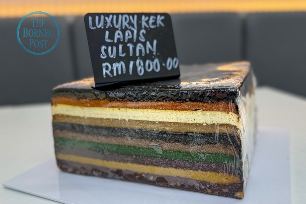 The 10-layer Luxury Kek Lapis Sultan at Abg K’ju Cake House for RM1,800 a tray. — The Borneo Post pic
