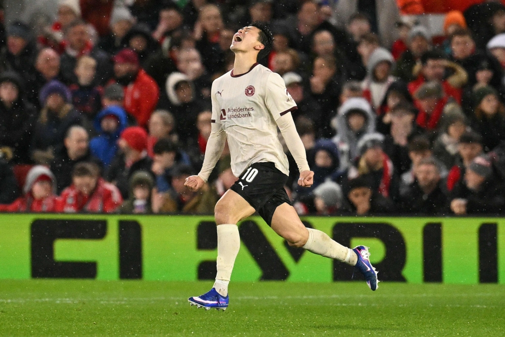 Midtjylland’s Cho Gue-sung celebrates scoring during the Uefa Europa League round of 16, first leg match with Nottingham Forest at The City Ground in Nottingham March 12, 2026. — AFP pic