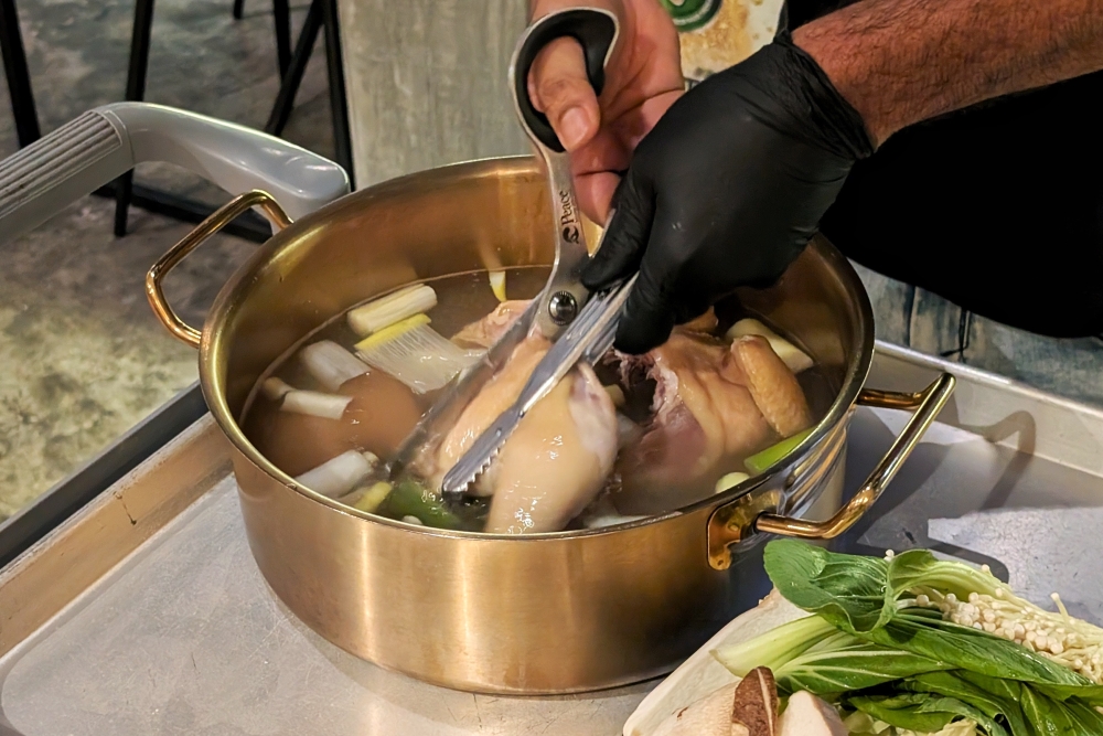 ‘Dakhanmari’ is a Korean whole chicken hot pot dish centred around a concentrated chicken broth, and a whole chicken, naturally. — Picture by Ethan Lau