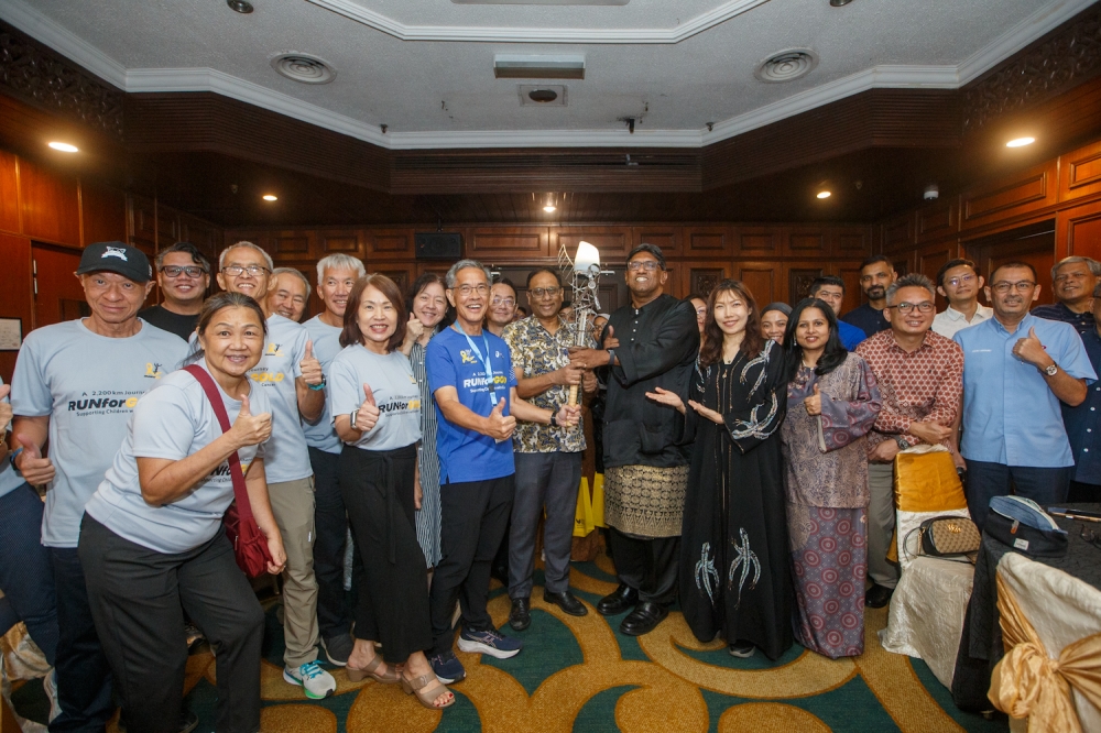 Supporters and organisers gather during a press conference for Lim Shyang Guey’s charity run supporting children with cancer in Kuala Lumpur on March 12, 2026. — Picture by Raymond Manuel