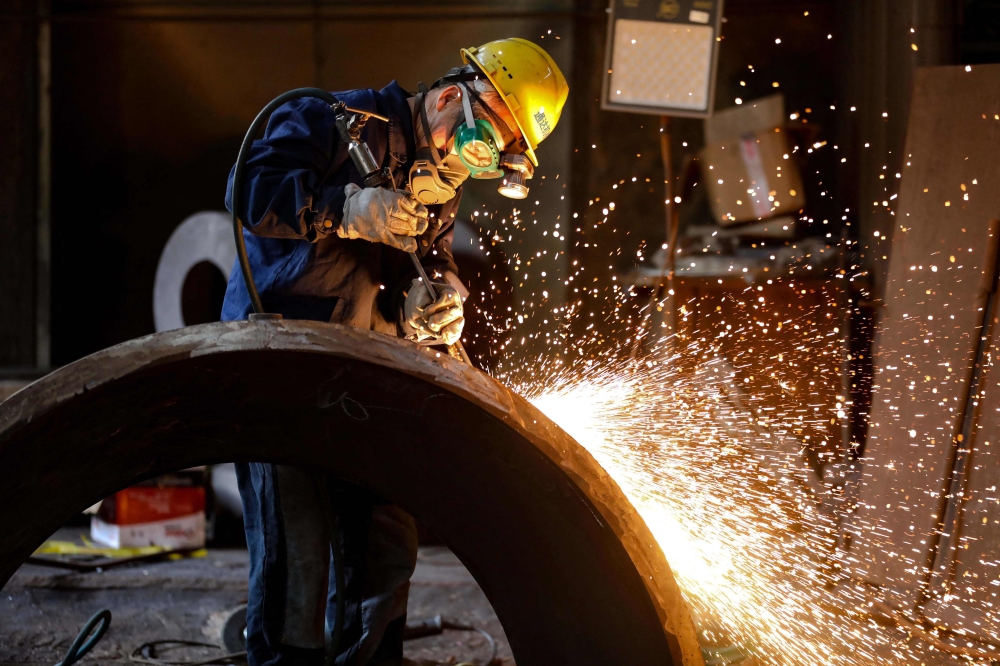 The US Trade Representative’s office has launched investigations into 60 economies over alleged failures to curb forced labour in supply chains. — AFP file pic