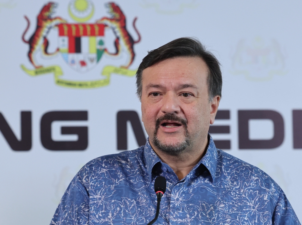 Finance Minister II Datuk Seri Amir Hamzah Azizan speaks at a press conference after a special Cabinet meeting in Putrajaya March 13, 2026. — Bernama pic