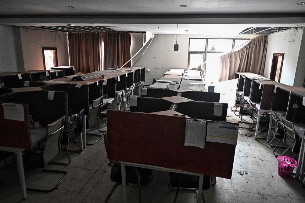 Work booths are pictured inside an abandoned scam centre in O’Smach town on the Thai-Cambodian border on March 12, 2026, during a press trip organised by Thailand’s Ministry of Foreign Affairs and the Royal Thai Army. — AFP pic 