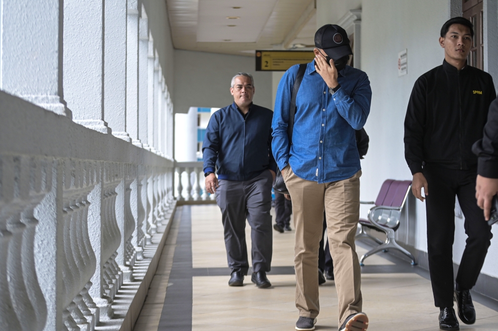 Khuzairi Yahaya, 55, pleaded not guilty after the charges were read out before Judge Awang Kerisnada Awang Mahmud. — Bernama pic