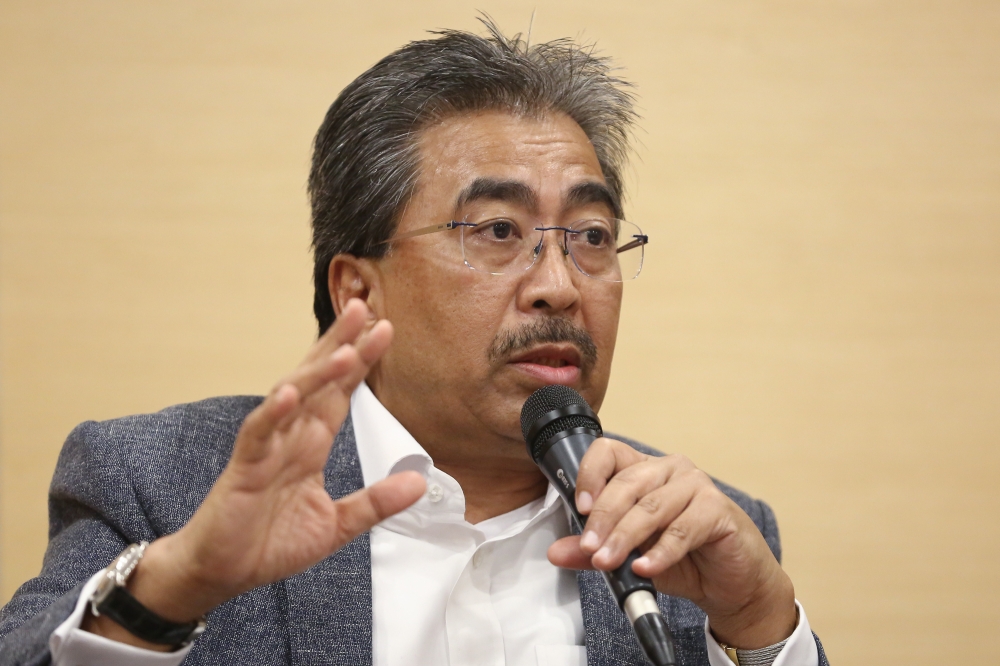 Investment, Trade, and Industry Minister (MITI) Datuk Seri Johari Abdul Ghani said even if Malaysia has excess production capacity, it does not mean that Malaysia is dumping the products exported to the US. — Picture by Yusof Mat Isa
