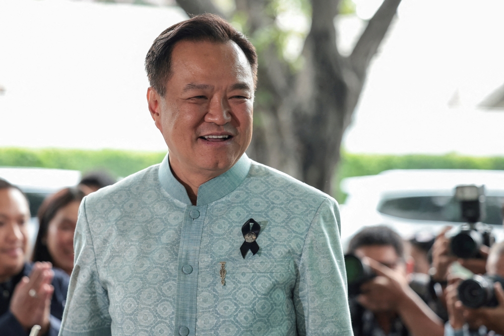 Anutin Charnvirakul, Thailand's caretaker Prime Minister, Bhumjaithai Party leader and prime ministerial candidate, reacts upon arrival ahead of a meeting with party members at Bhumjaithai Party headquarters, after the party won the general election, in Bangkok, Thailand, February 12, 2026. 