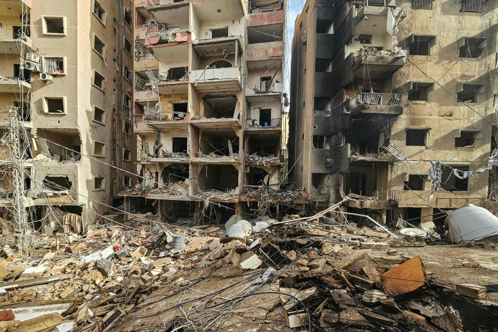 A photograph shows damaged buildings at the site of an overnight Israeli airstrike that targeted the Haret Hreik neighbourhood in Beirut's southern suburbs, on March 14, 2026. — AFP pic