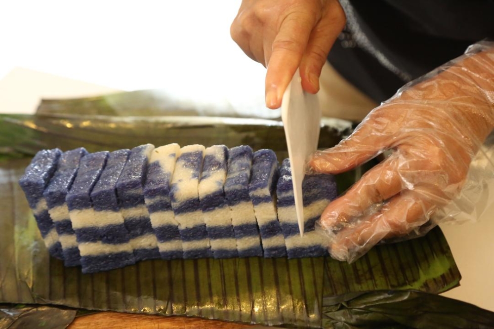The ‘pulut tekan’, a traditional Melaka Chetti dessert made with steam glutinous rice and coconut milk, is of one the many recipes found in the cookbook. — Picture courtesy of MCHAM